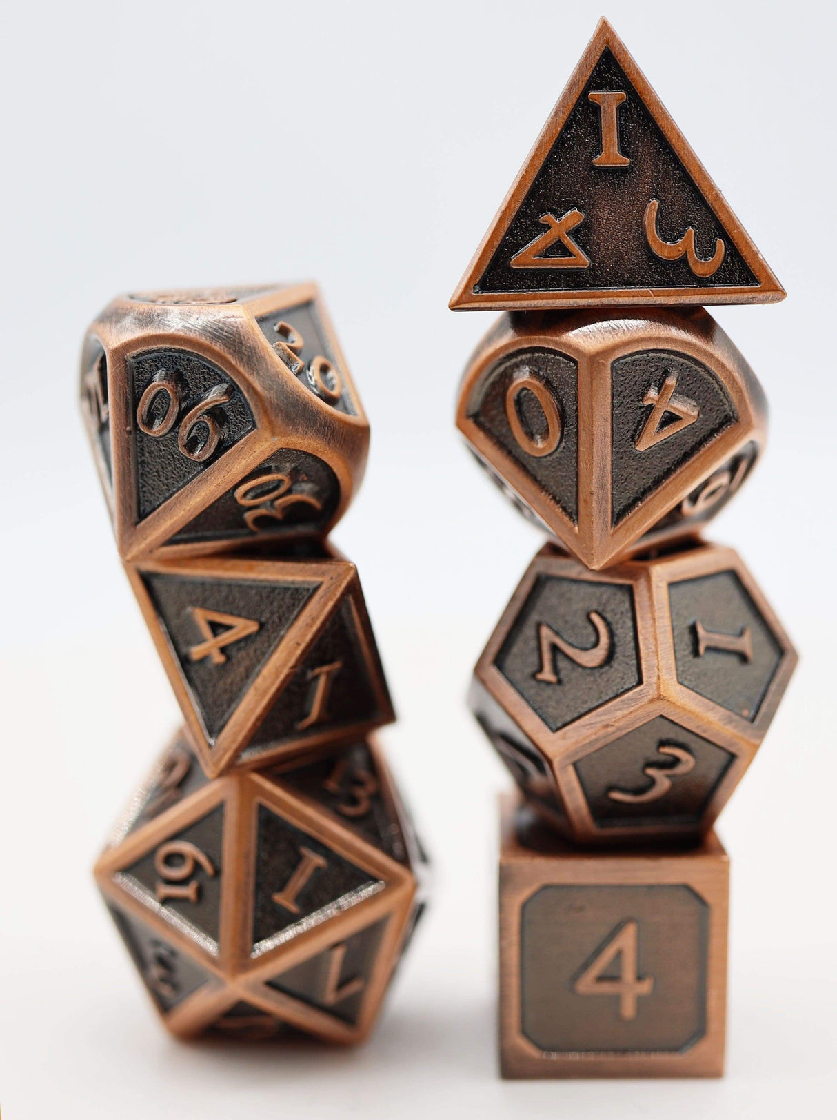 *discontinued* Embossed Shiny Copper Metal RPG Dice Set